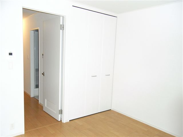 ブランドール城北の寝室